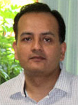Amitav Mukherji's profile opens in a pop-up window
